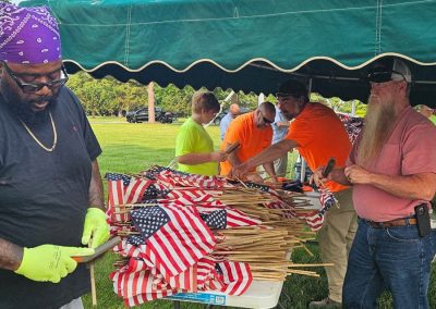 more volunteers with american flags